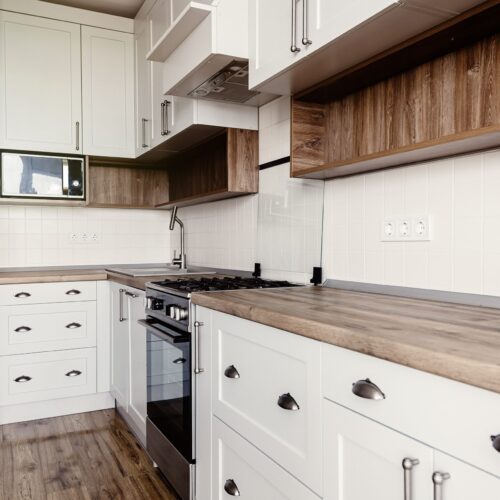 light-gray-kitchen-interior-with-modern-cabinets-a-NAP2QML-min